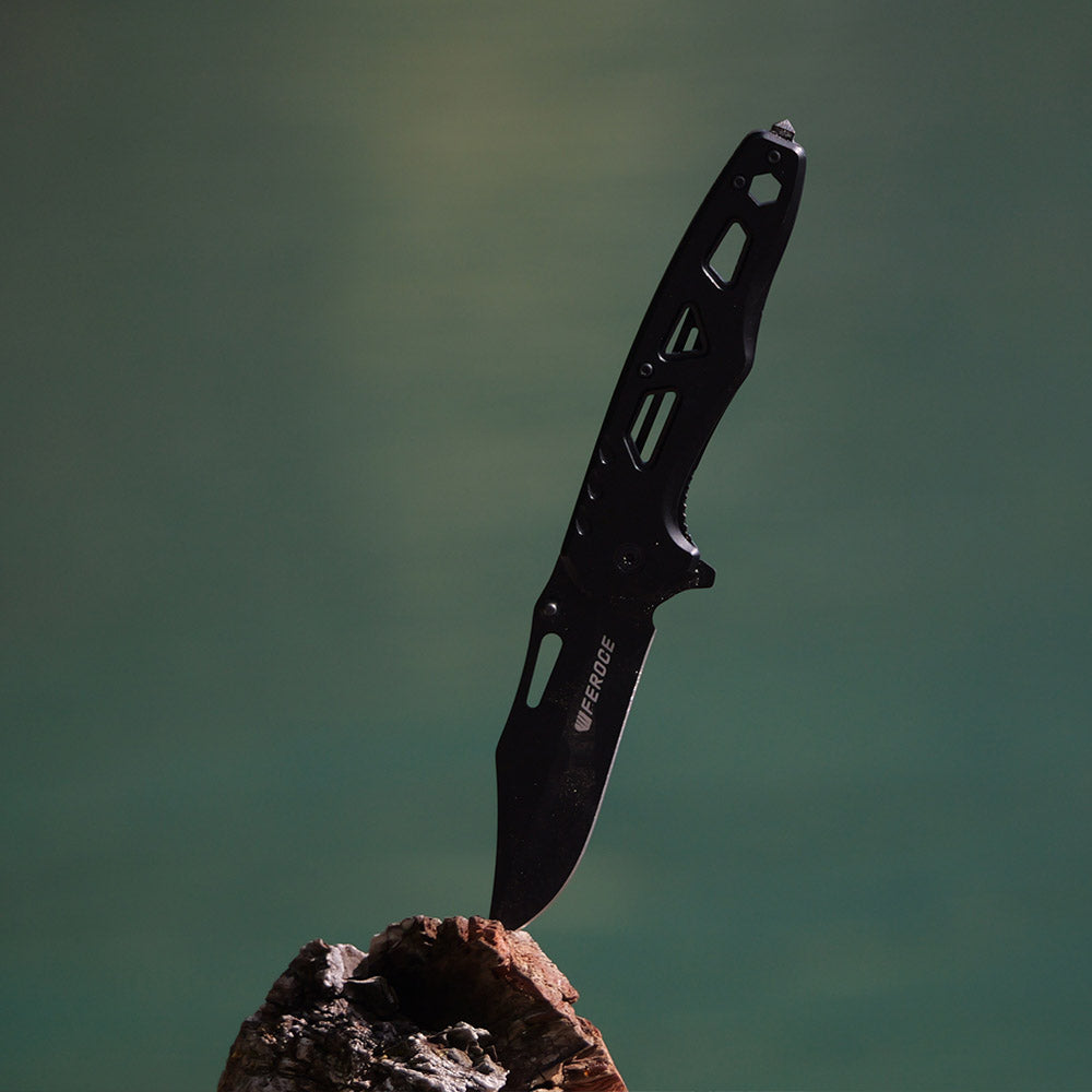 Couteau de poche noir avec pochette en cuir